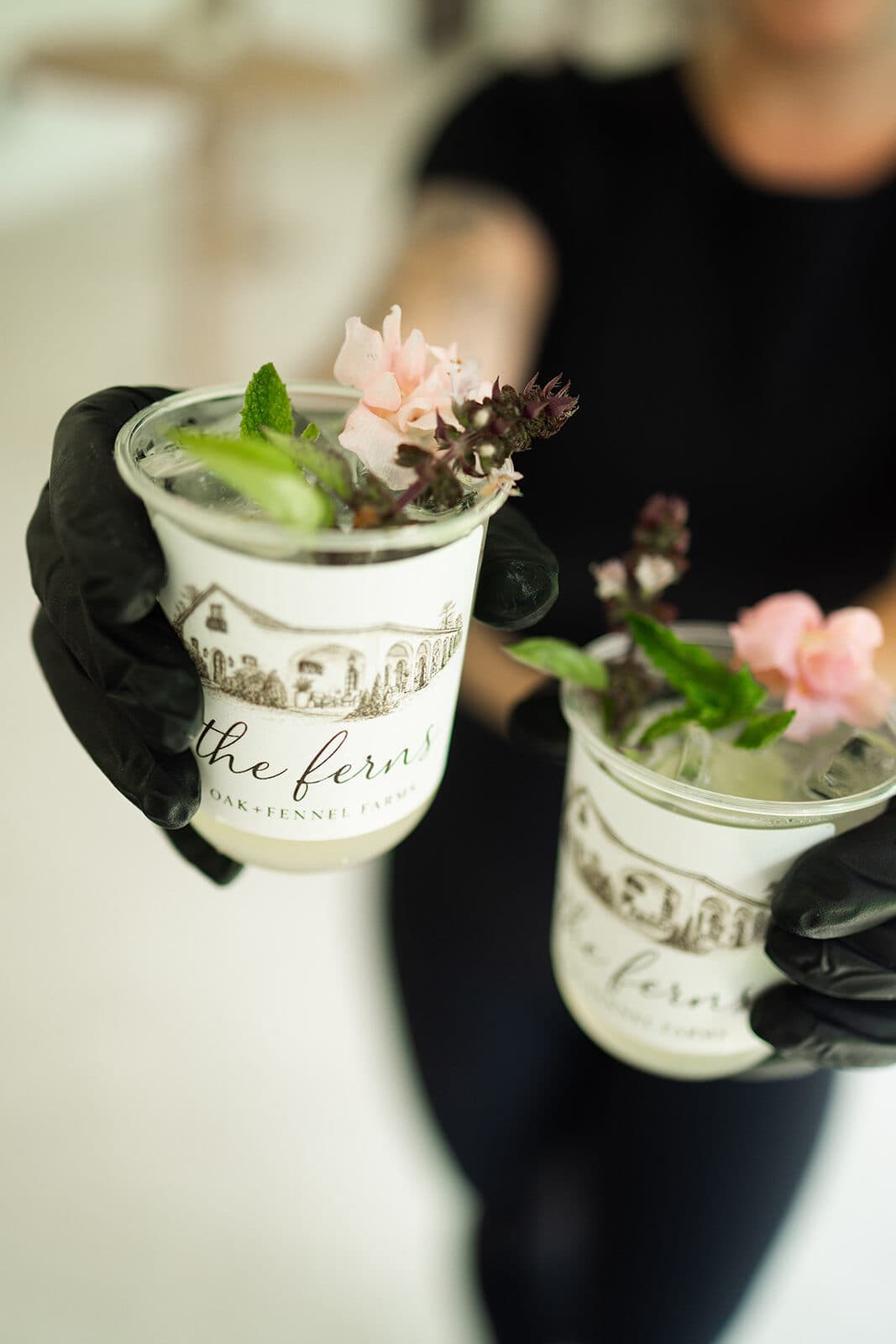 Garnished signature cocktails with fresh edible flowers