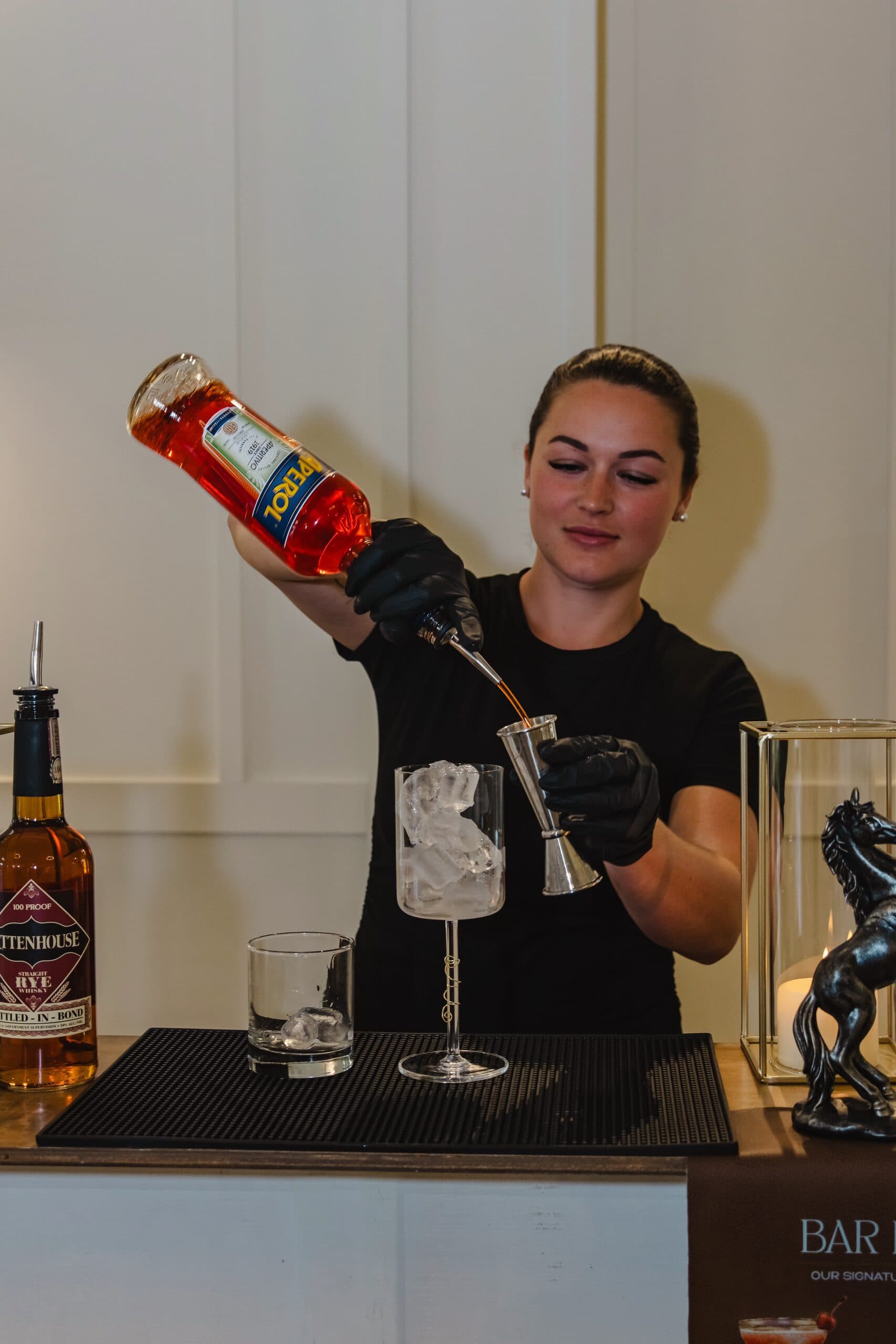 Bartender crafting a cocktail tableside